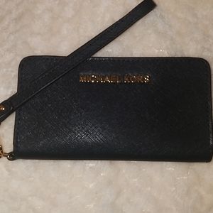 Michael Kors Phone Wallet, New never used.